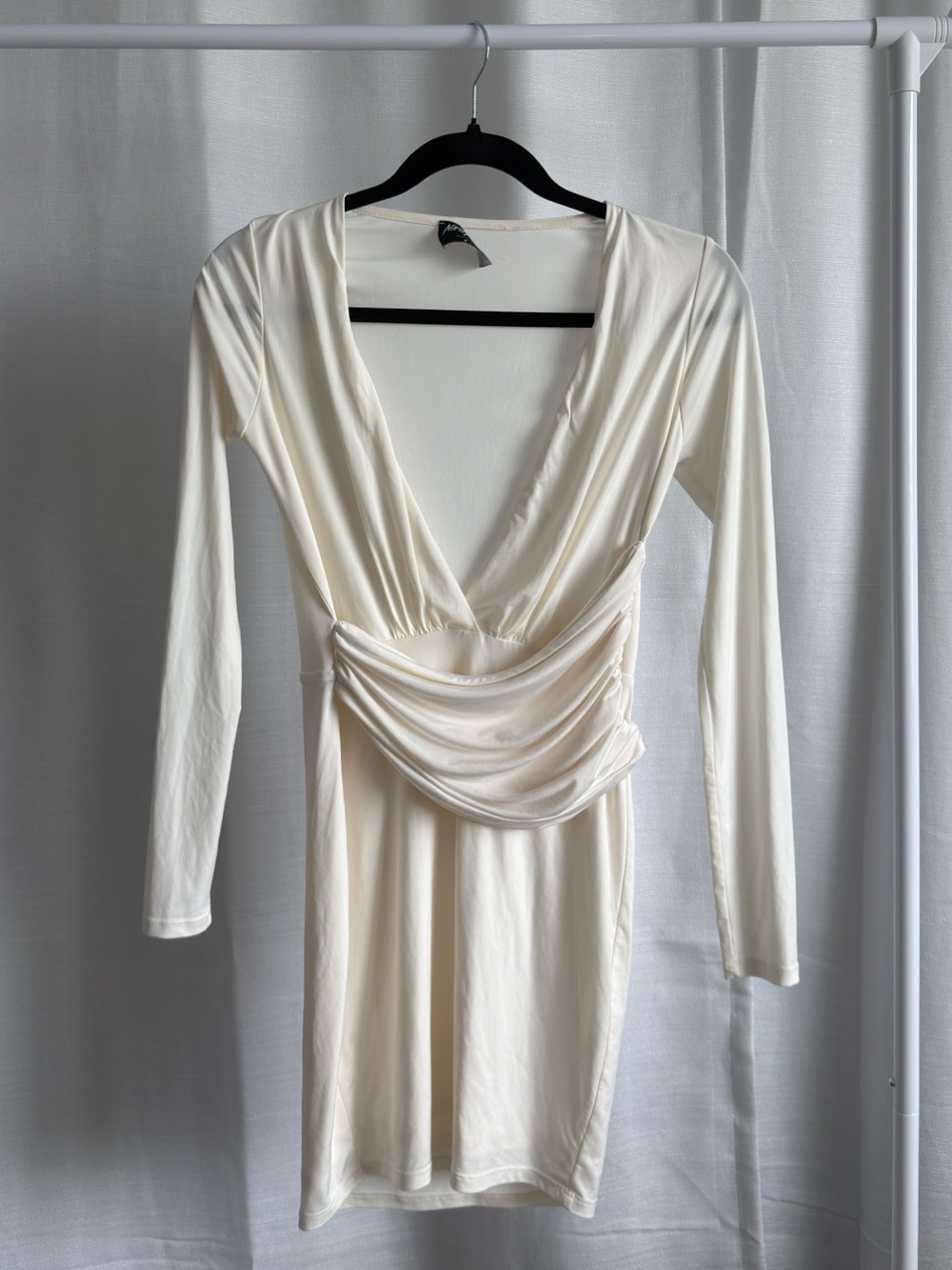 Cream long sleeved body con dress